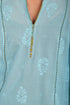 Embroidery tunic with contrast color piping in printed cotton voile